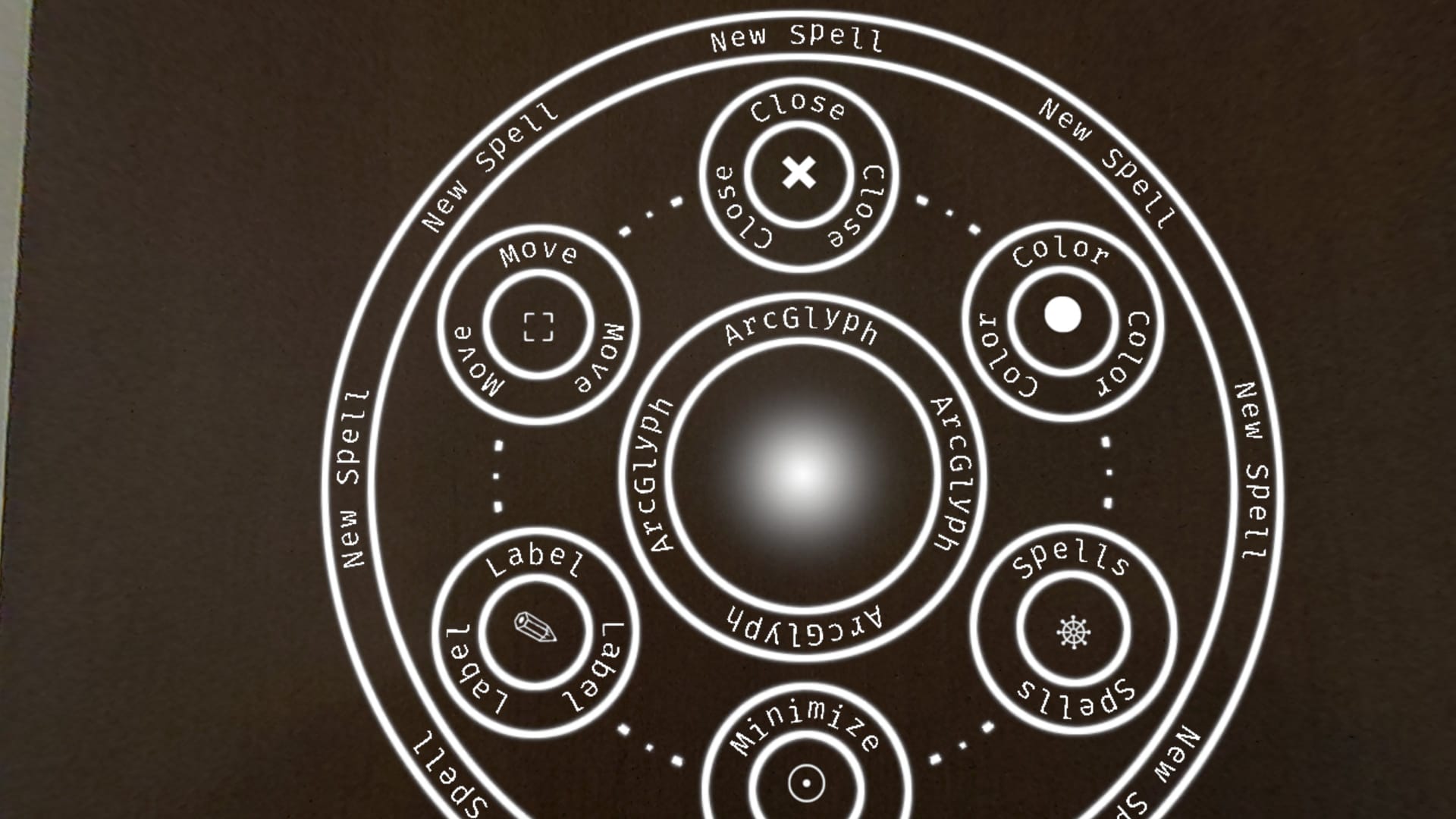 ArcGlyph spell circles anchored above a desk